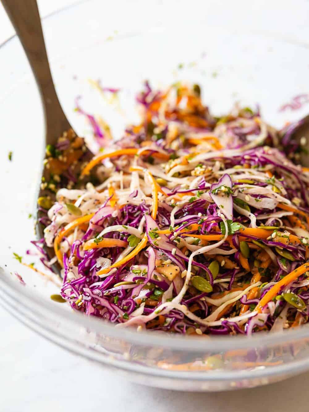 Coleslaw in a glass salad bowl.