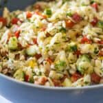 Mixed Lemon Orzo Salad in a blue salad bowl.