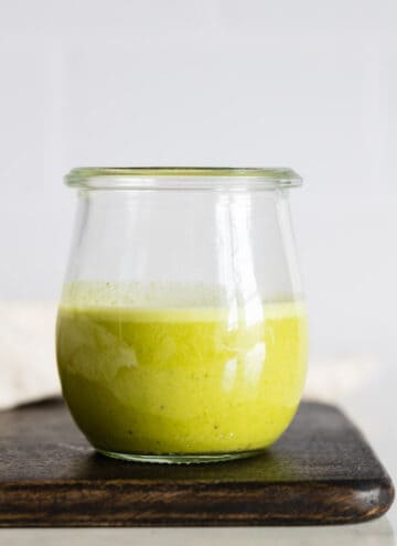 Citrus Basil Dressing in a glass jar.