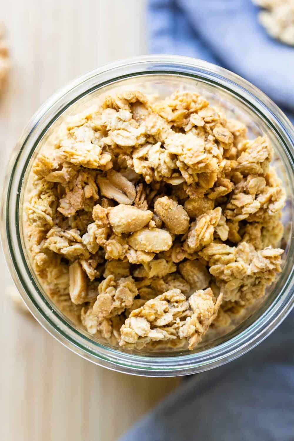 Peanut Butter Granola in a glass jar.