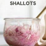 Sliced shallots in a glass jar and text overlay reading: Quick Pickled Shallots.