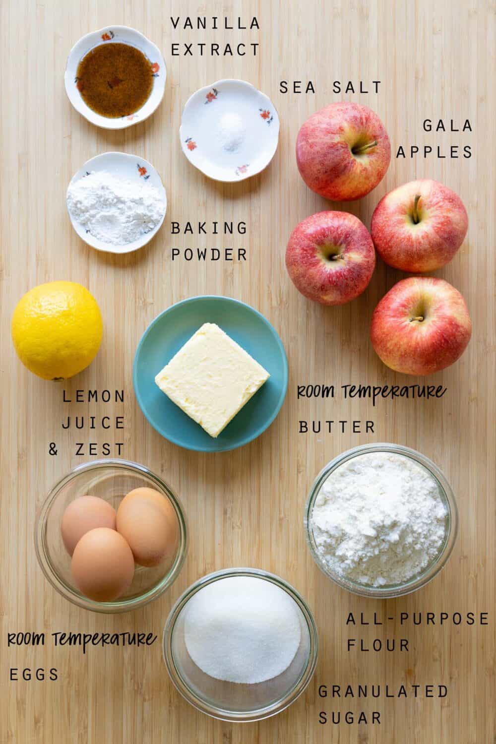 Ingredients for German Apple Cake laid out on a kitchen counter.