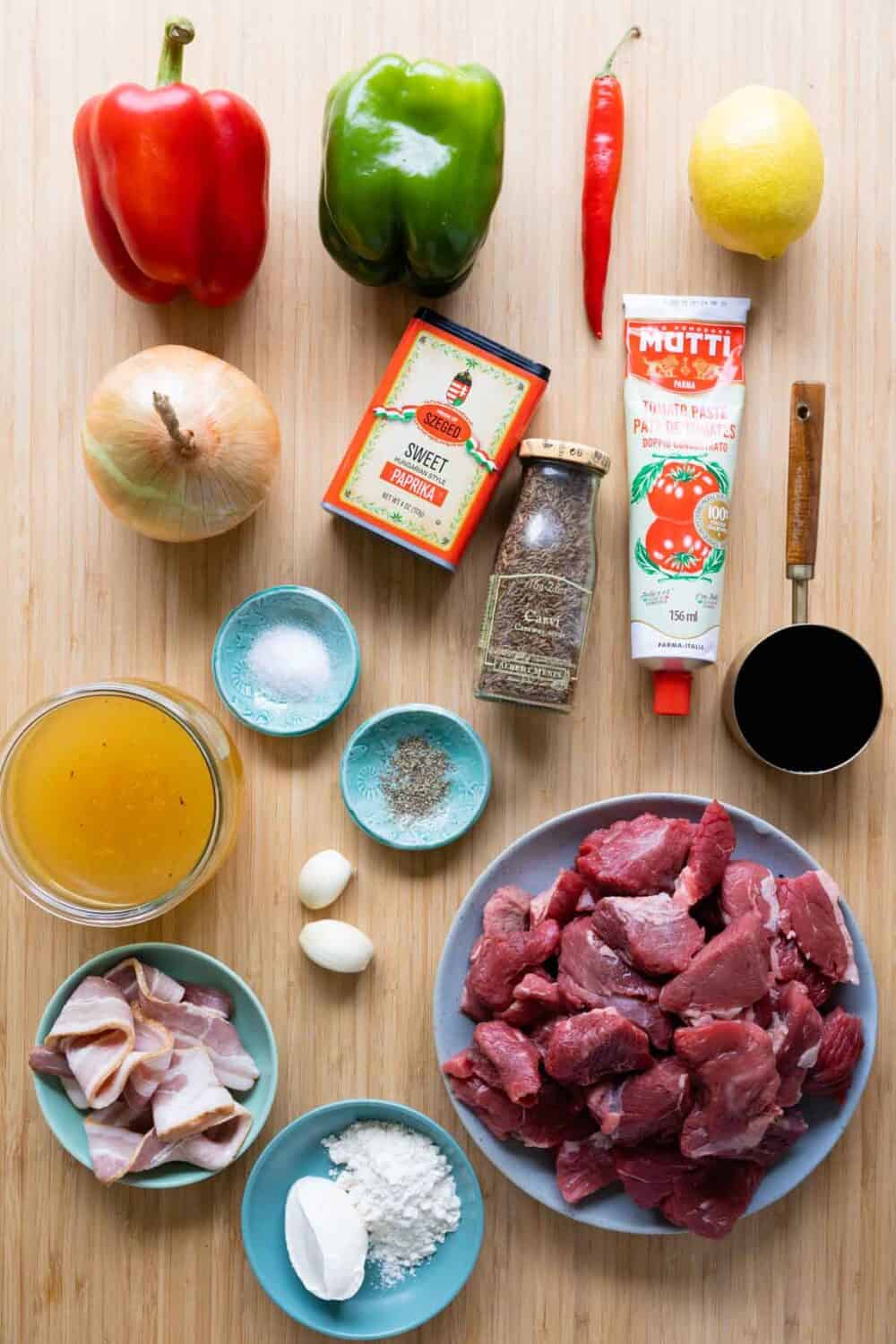 Ingredients for German Goulash laid out on a kitchen counter.