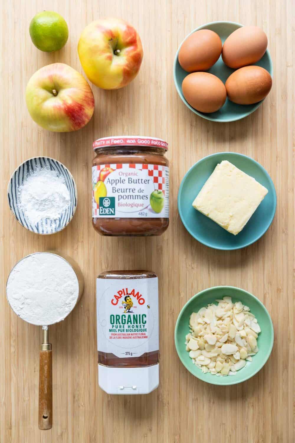 Ingredients to make apple bread laid out on a kitchen counter.