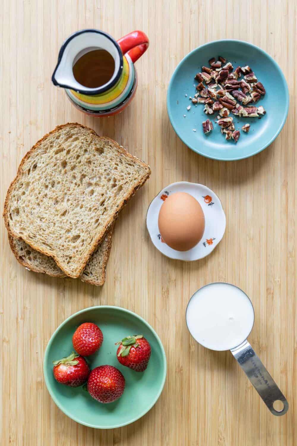 Ingredients for whole-grain french toast laid out on a kitchen counter.