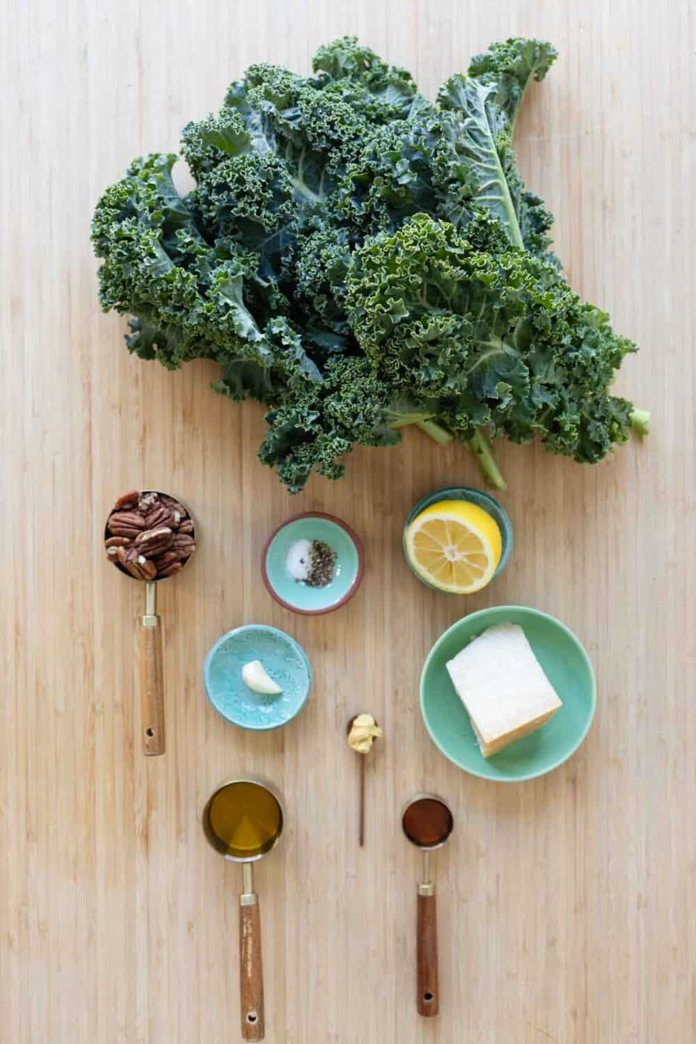 Ingredients for Kale Crunch Salad laid out on a kitchen counter.